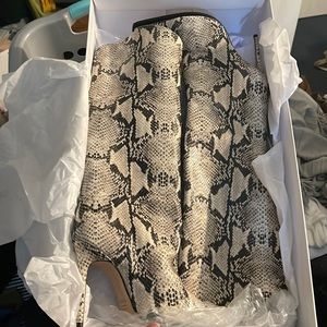 Never worn Schutz boots.